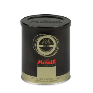 Черна и златна кутия печено и смляно кафе Musetti® Gold Cuvée, отбелязано като юбилеен бленд, идеално за следващия ви Outin.